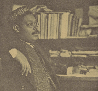 Dusé Mohamed Ali at his desk 1913
