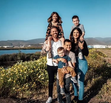 large young Caucasian family in a prarie