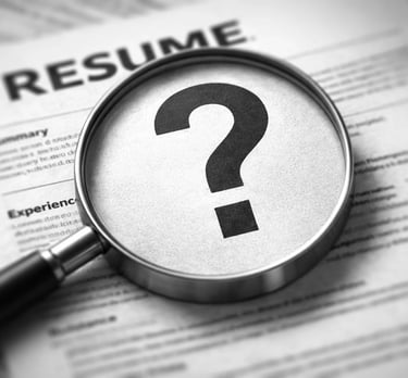 a magnifying glass scaning a resume but it can't find a keyword and shows an interrogation mark