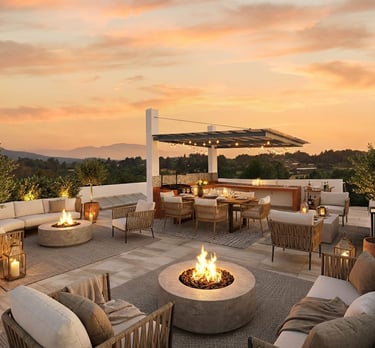 Patzcuaro Luxury rooftop patio at sunset with fire pits, outdoor lounge furniture, and dining area.
