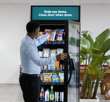 A man using a Micromart™ smart vending machine