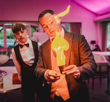 Wedding photographer adjusting lens during Yorkshire wedding – The Wedding Edit