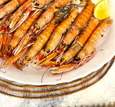 Grilled fresh langoustines prepared by villa eats private chefs Naxos served at a villa in Naxos