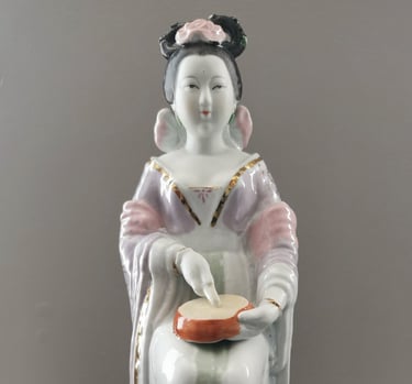 ceramic asian japanese chinese woman musician playing an instrument biqigu drum