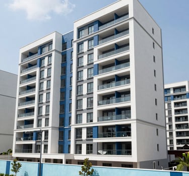 Wide-angle photograph of a modern residential development in Abidjan, showcasing clean lines and contemporary architecture under a bright sky, with accents of medium blue and light blue in the landscape design.