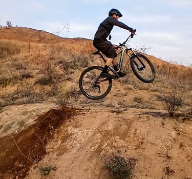 Small Takeoff:  Beginner mountain bike jump with small dirt takeoff