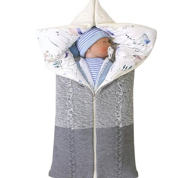 Knitted shell baby sleeping bag with cotton liner. Zipper access to open and convert to a baby blanket.