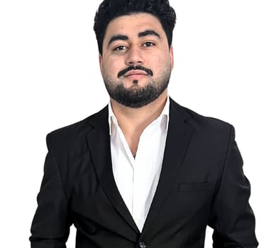 a man in a suit and white shirt