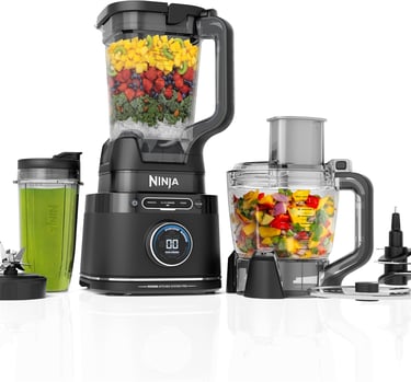 Ninja Foodi Power Blender and Food Processor System with smoothie cup and fruit ingredients.