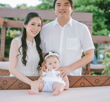 Family portrait with baby at balcony during Sofitel Nusa Dua Bali family photography session