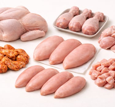 Processed halal chicken cuts including breast fillets, wings, drumsticks, and diced poultry