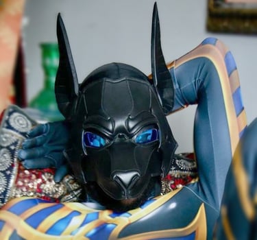 Man in hero costume, posing in a pup mask.