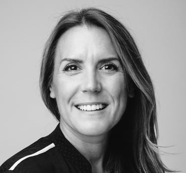 Black and white headshot of a white, middle aged women who is a counsellor