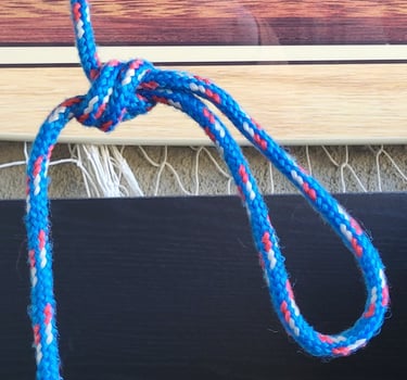 Overhand Loop Knot in blue synthetic rope