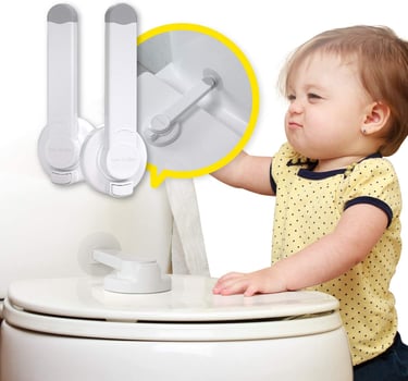 small child trying to open toilet with lock