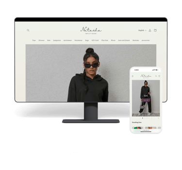 a woman in a black top and sunglasses on a computer screen