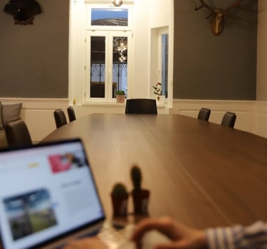 a person work in coworking space in Old Town on a laptop