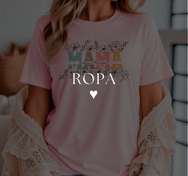 a woman wearing a pink shirt and jeans with a heart shaped mama shirt