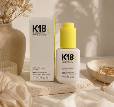 K18 Molecular Repair Hair Oil product image with white and yellow packaging
