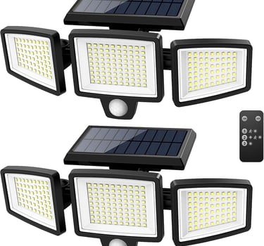 a group of three solar powered flood lights
