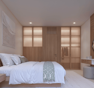 Bed view inside Villa Oraya, combining minimalist design with warm textures and calming Bali vibes