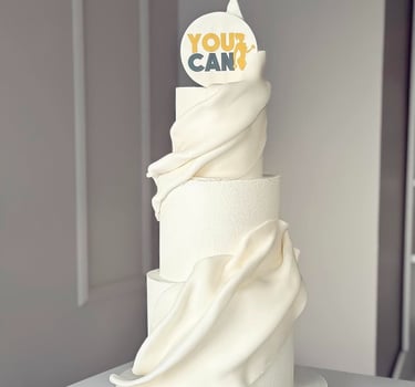 a cake with a white cake topperf and a cake topperf