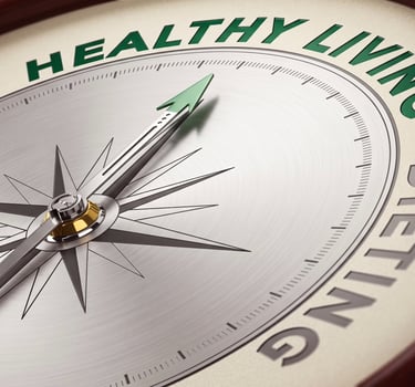 A conceptual compass pointing towards healthy living and dieting for a wellness lifestyle.