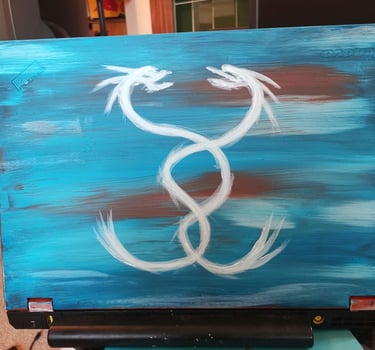 twin dragon on the back of a laptop