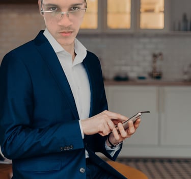 Businessman holding a smartphone