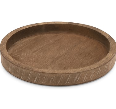 A round wooden serving tray with a raised edge and smooth natural wood grain finish, on white back