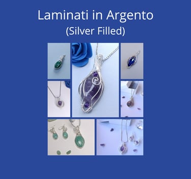 Handmade silver filled wire wrapped jewelry including natural gemstone pendants and earrings.
