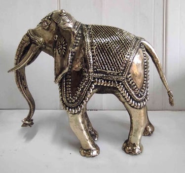 "Tribal-style designer brass elephant with fine detailing, left view-Prepared for export"