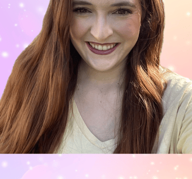 a woman with long hair and a smile on her face