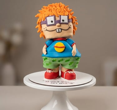 Torta temática inspirada en Carlitos elaborada por Cocina con Ely, creada en formato 3D con modelado