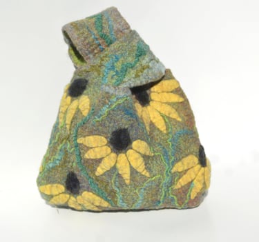 Handmade felted wool handbag featuring yellow flowers and green leaf patterns on a green background.