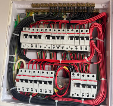 Electrical switchboard by Electrician attending emergency power outage 