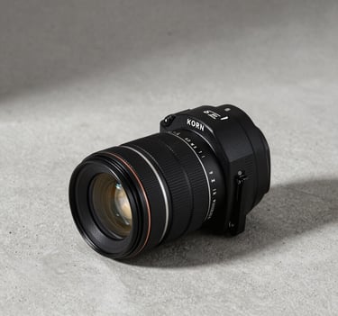 Commercial photography of a high-end designer accessory placed on a light grey concrete surface, minimalist and professional lighting style.