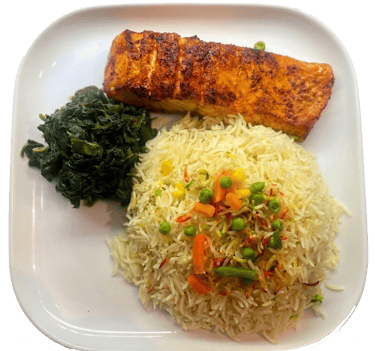 Somali fish dish with rice and vegetables at Paradise Kentish Town London