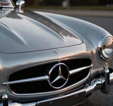 A close-up of the Mercedes-Benz 300SL grill and star emblem, reflecting the sunset. The palette is dominated by #B2BEB5 chrome and deep #1C2833 shadows. Sharp focus, sophisticated lighting.