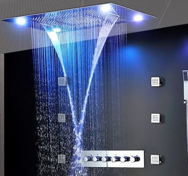 a shower head with a blue light shining down