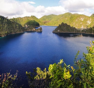 A panoramic view of the Montebello Lakes with crystal clear blue water in Chiapas Mexico