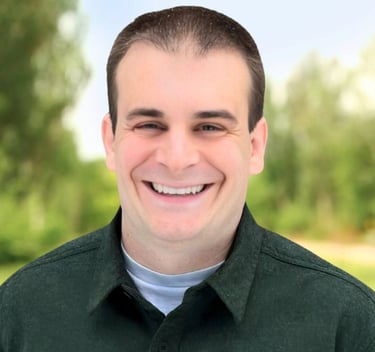 a man with a green shirt and a white shirt