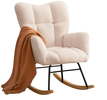 a cream rocking chair with a blanket on it