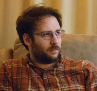 Travis relaxing at home.