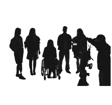 Silhouetted diverse film crew and actors, including a woman in a wheelchair, on a professional movie set.
