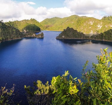 A panoramic view of the Montebello Lakes with crystal clear blue water in Chiapas Mexico