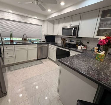 A cluttered kitchen with dirty dishes, overflowing trash, and food debris on countertops, showcasing a messy domestic space.