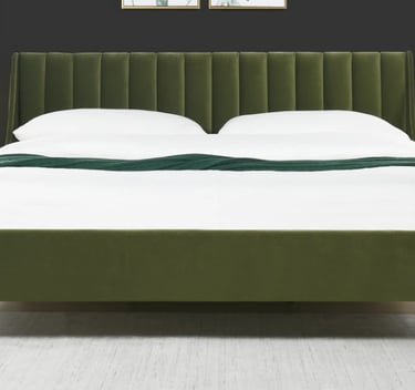 Modern olive green velvet platform bed with a channel-tufted headboard and white linens.