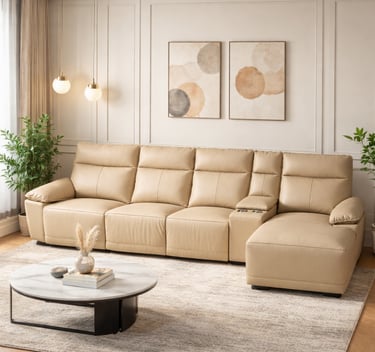 Beige leather reclining sectional sofa with chaise and marble coffee table in a modern living room.