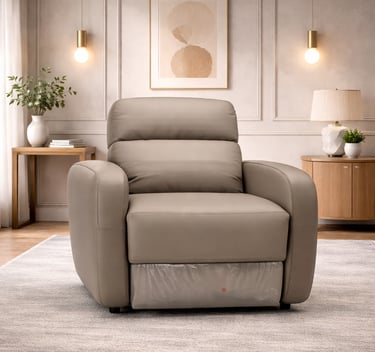 Modern taupe leather power recliner chair in a minimalist living room with neutral decor.